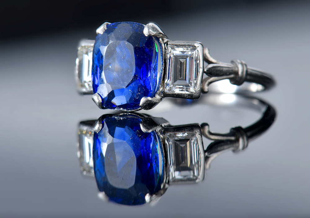 A Platinum Ring Set With A Cushion Cut Sapphire Of Approximately 3.1Cts. Sold For £4,600