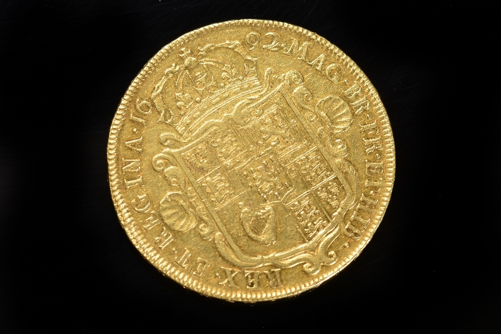 A 1692 William And Mary Gold Five Guinea Piece, Near VF. Sold For Ś8,400