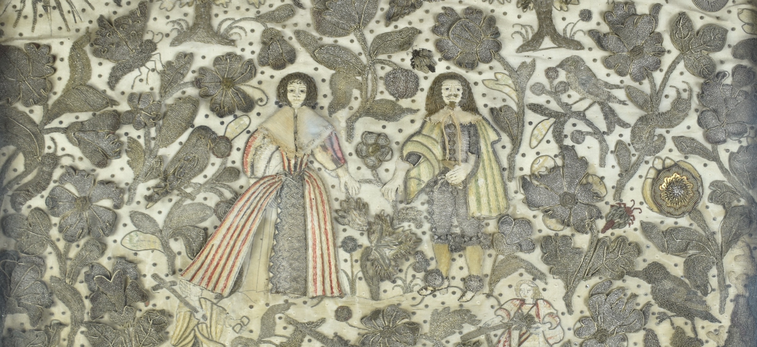 Embroidered clothing with man & woman with floral pattern