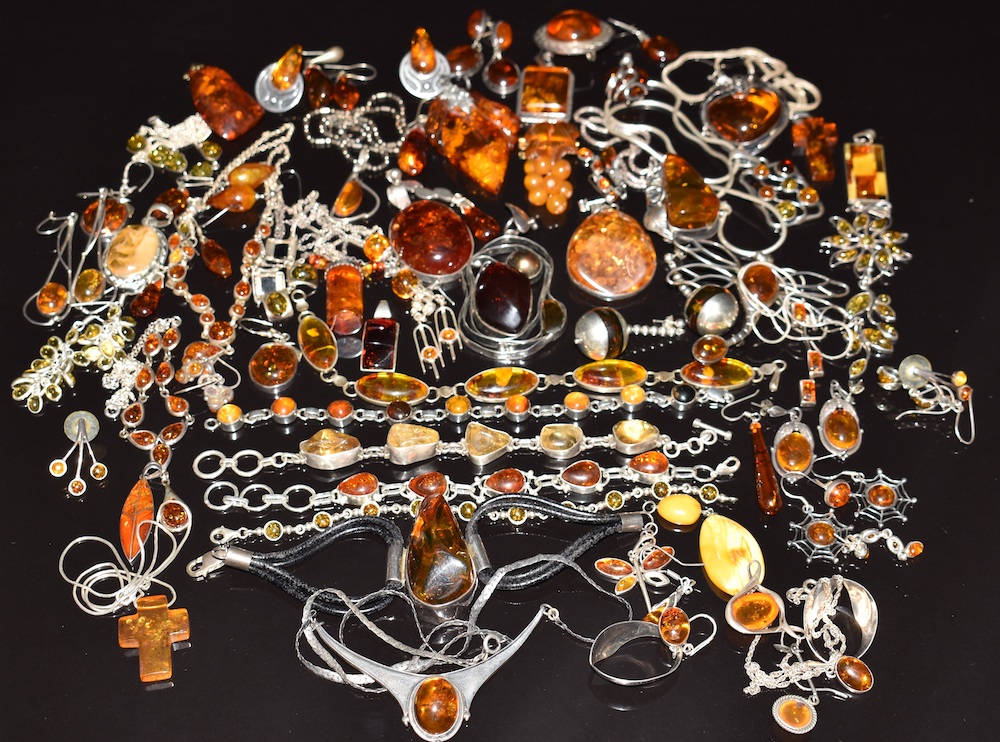 A Collection Of Silver Set With Pressed Amber. Sold For £750
