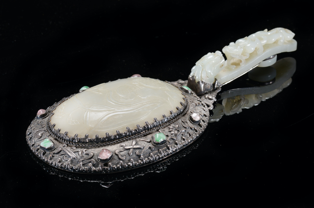 A 19Thc Chinese Mirror, The Handle A Celadon Jade Belt Hook Carved With Dragon And Lizard Decoration. Sold For £3,600