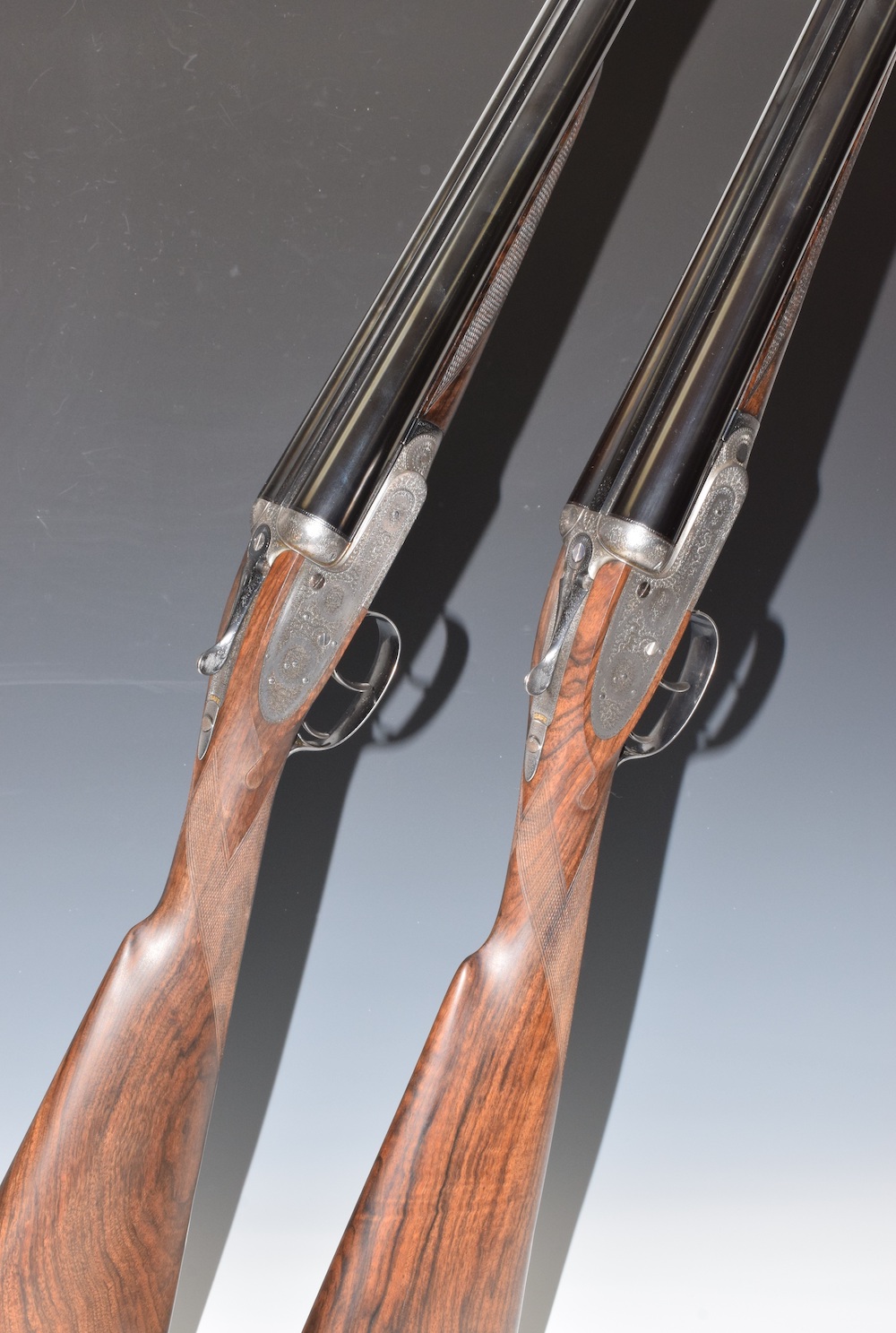 A Pair Of James Purdey & Sons 12 Bore Self Opening Sidelock Side By Side Ejector Shotguns £14,500
