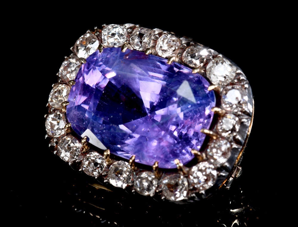 A Victorian Brooch Set With A Cushion Cut Natural, Purple Sapphire Surrounded By Old Cut Diamonds, Sold For £16,000